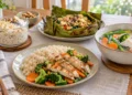 Empat hidangan di meja makan berupa oat pisang, nasi ayam dengan brokoli dan wortel, pepes tahu, serta sup ikan sayuran