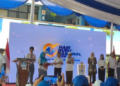 Sejumlah peserta menghadiri acara peluncuran Bulan Guru Nasional 2026 di panggung dengan layar Hari Guru Nasional