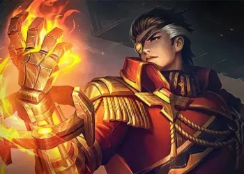 Karakter Valir mengenakan pakaian merah dan emas dengan satu tangan terangkat yang dikelilingi kobaran api